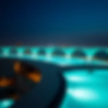 Aura Sky Pool at Night Evening view of the Aura Sky Pool illuminated, adding to Dubai's vibrant nightlife.