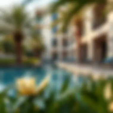 Swimming pool area at Murano Residence 2 surrounded by lush landscaping