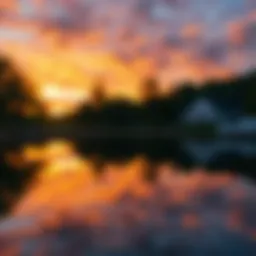 Serene sunset over a tranquil lake reflecting vibrant colors