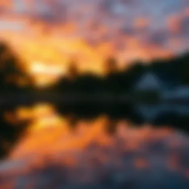 Serene sunset over a tranquil lake reflecting vibrant colors