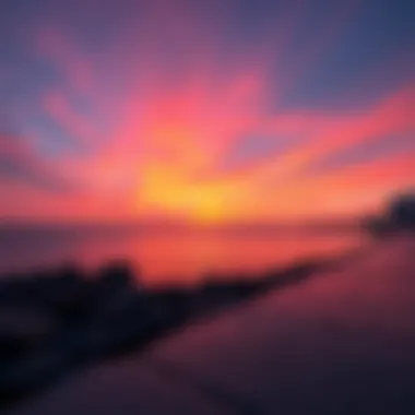 Stunning sunset view over The Pointe Beach with vibrant hues reflecting on the water